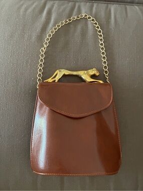 Rare vintage Sasha purse with gold panther/jaguar hardware